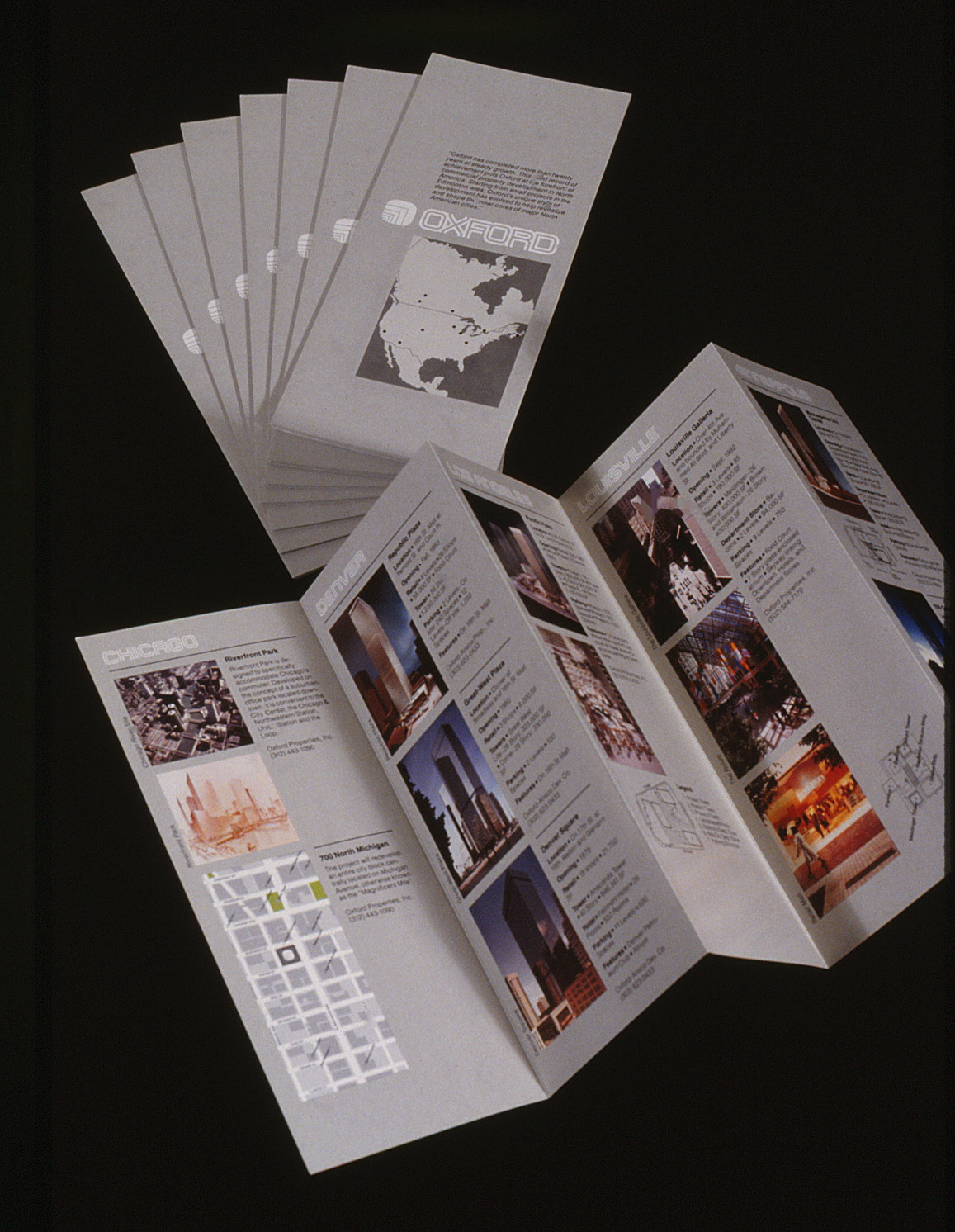 The fold-out brochures shown closed and folded out with multiple spines.