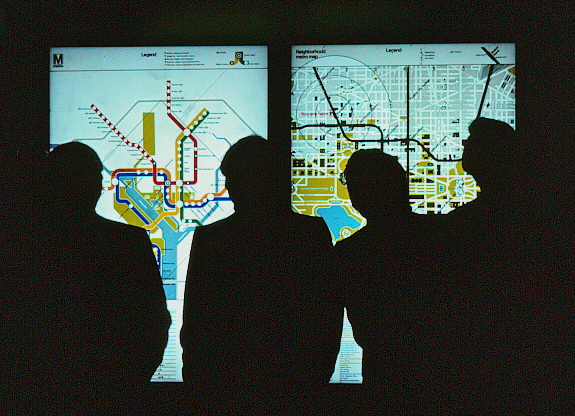 Men looking at the system map