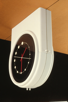 Saddle mounted clock into ceiling concept
