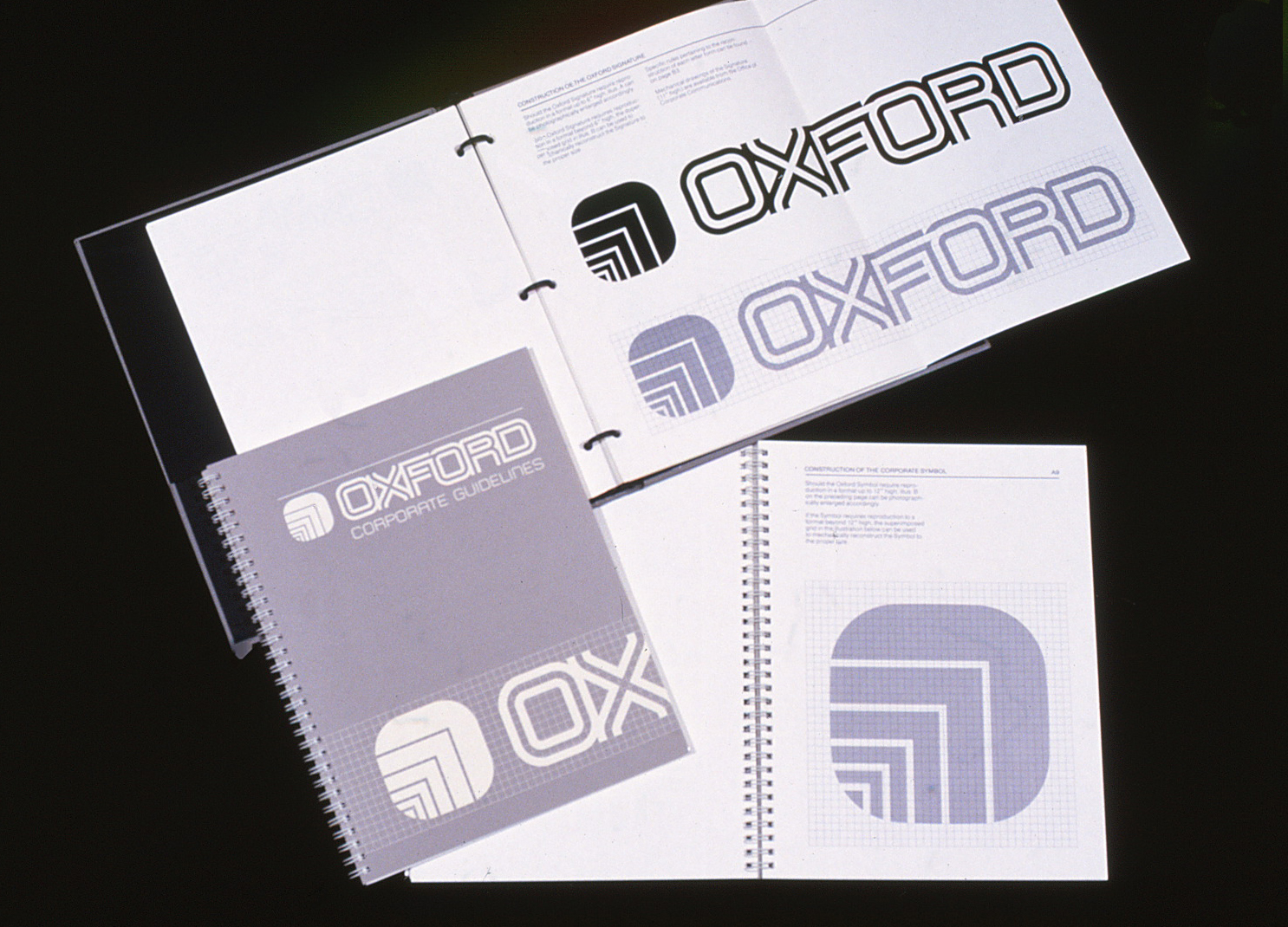 The Oxford Graphic Standards Manual shown indifferent layouts, opened and closed.