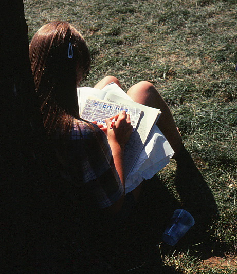 Young girl sitting on national mall grass