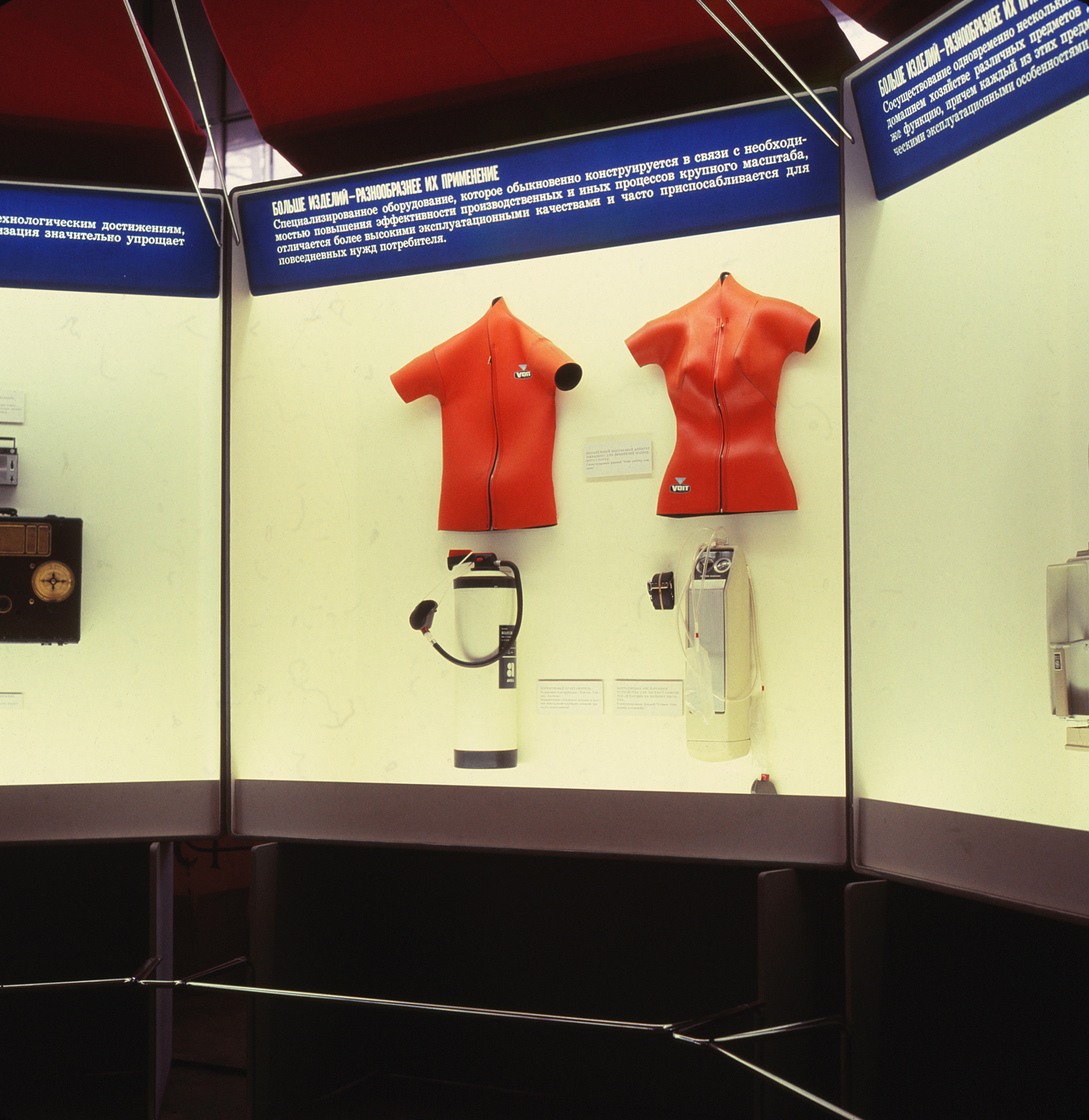 Display cases featuring scuba gear and wetsuits.