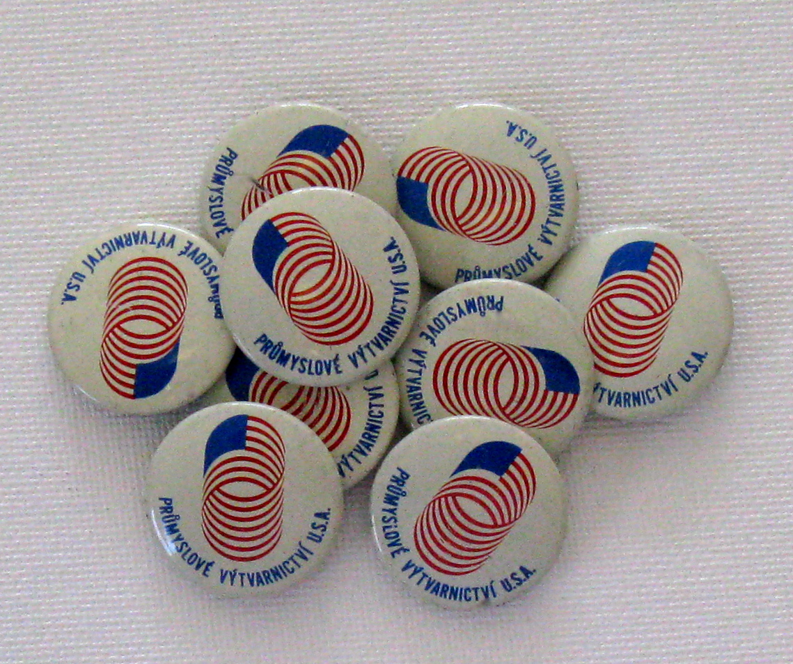 Free buttons given away at the exhibit, 
         and snatched up very quickly by visitors.
